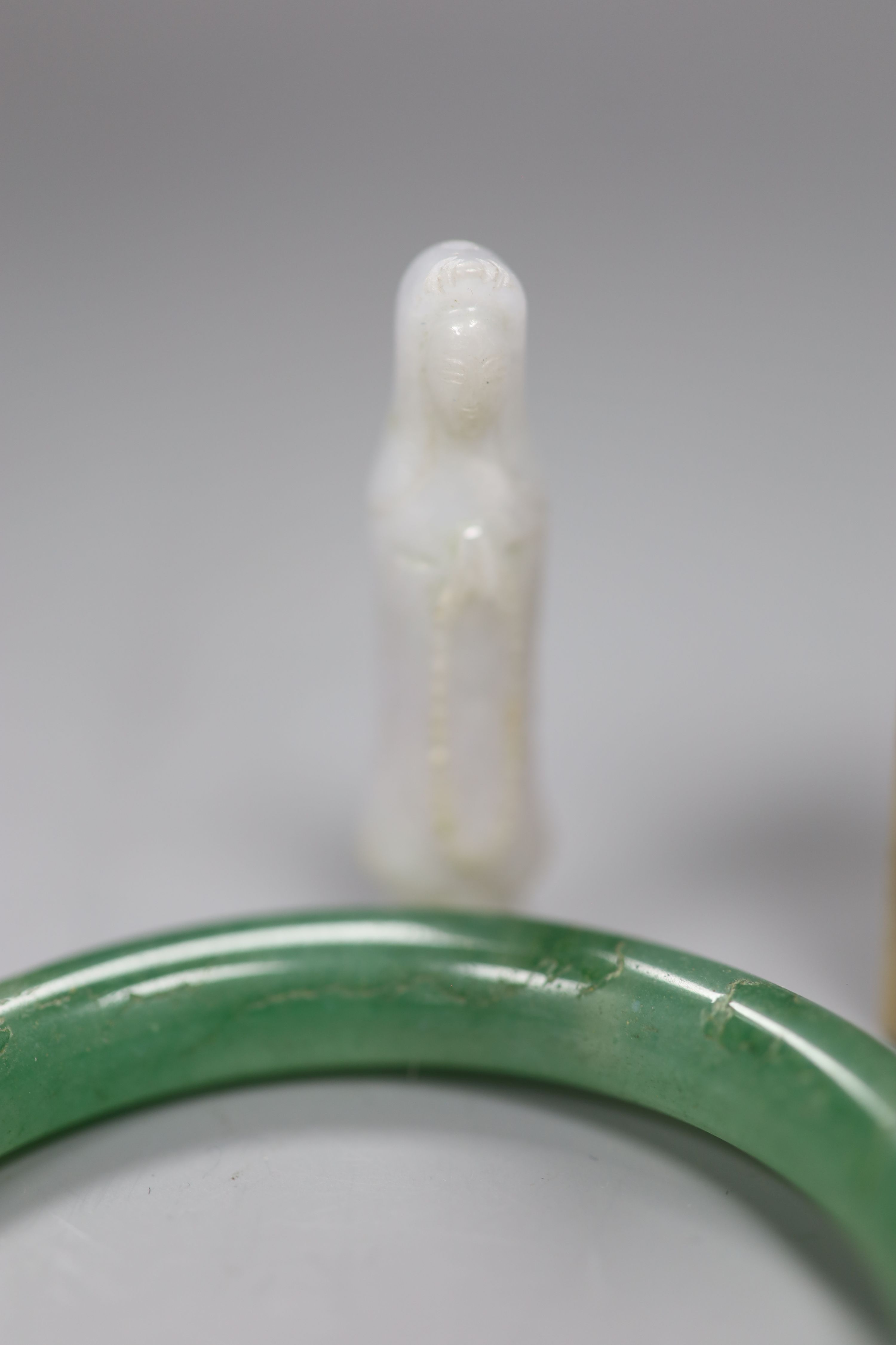 Chinese jades and corals: two seals, a bangle etc.